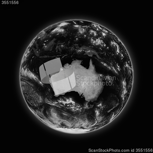 Image of Australia on dark planet Earth