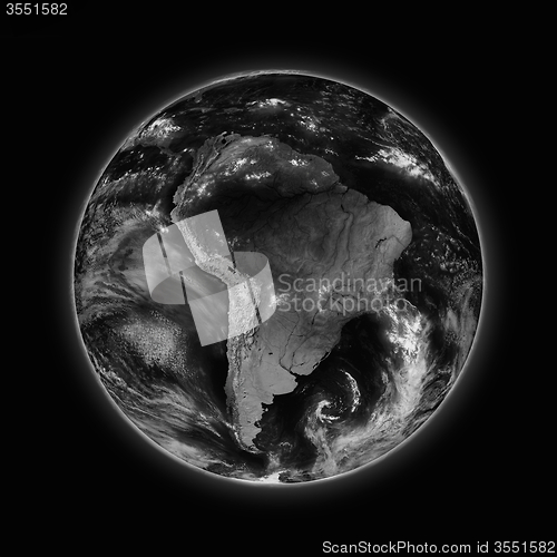 Image of South America on dark planet Earth