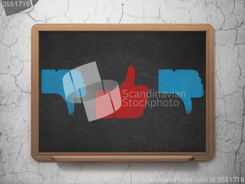 Image of Social media concept: thumb up icon on School Board background