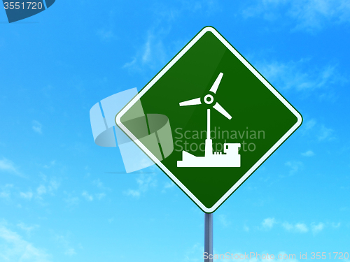 Image of Industry concept: Windmill on road sign background