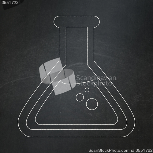 Image of Science concept: Flask on chalkboard background