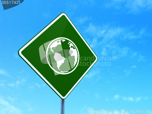 Image of Studying concept: Globe on road sign background