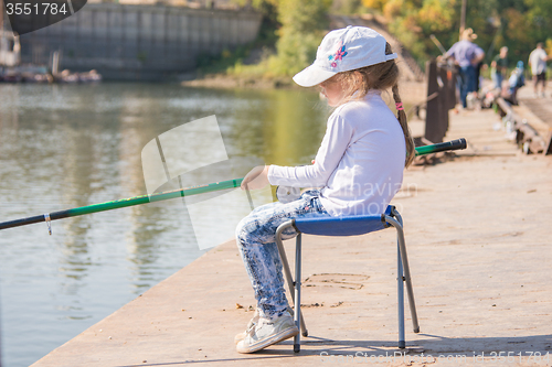 Image of Five-year girl fishing