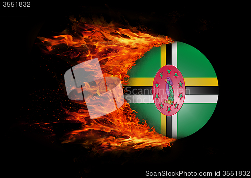 Image of Flag with a trail of fire - Dominica