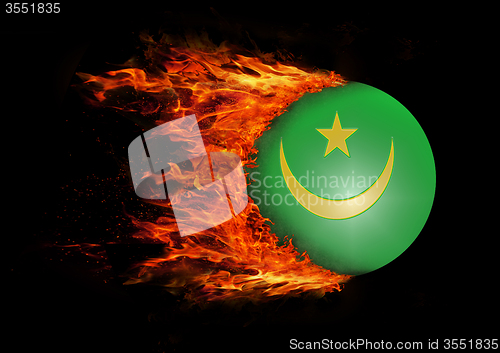 Image of Flag with a trail of fire - Mauritania