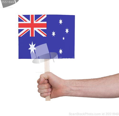 Image of Hand holding small card - Flag of Australia