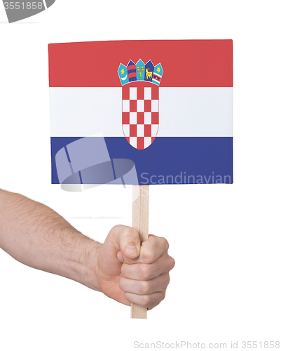 Image of Hand holding small card - Flag of Croatia