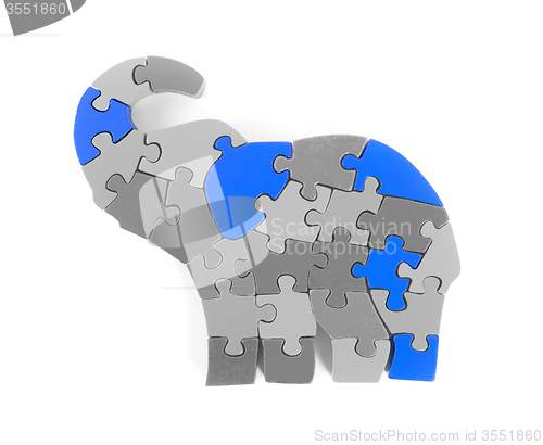 Image of Colorful puzzle pieces in elephant shape