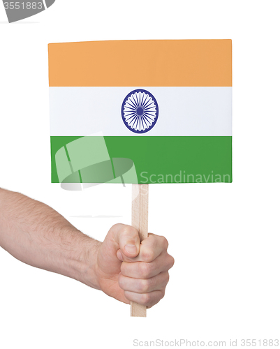 Image of Hand holding small card - Flag of India