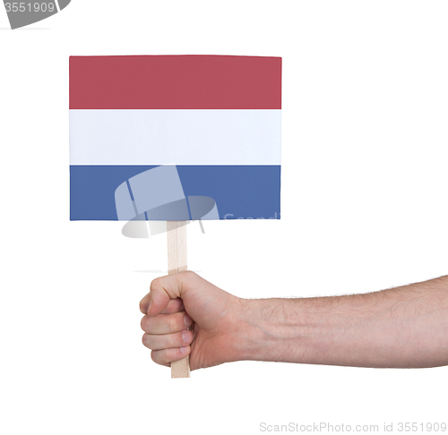 Image of Hand holding small card - Flag of the Netherlands