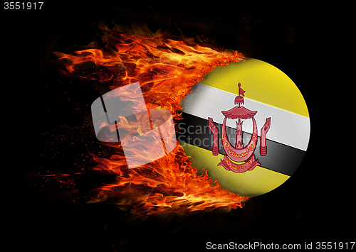 Image of Flag with a trail of fire - Brunei