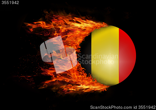 Image of Flag with a trail of fire - Belgium