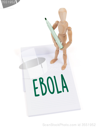 Image of Wooden mannequin writing - Ebola