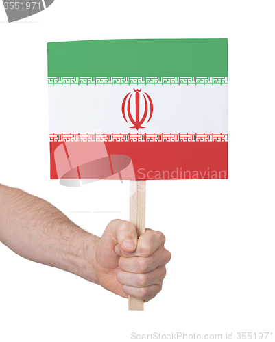 Image of Hand holding small card - Flag of Iran