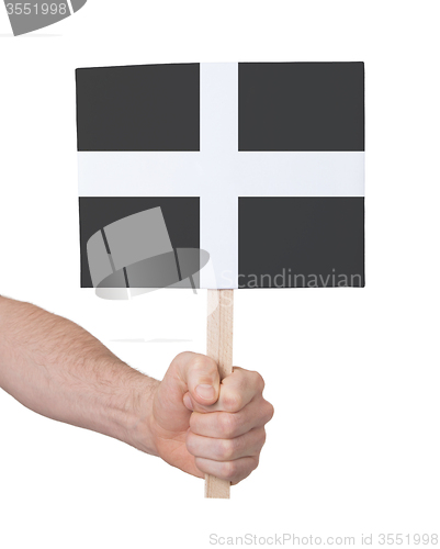 Image of Hand holding small card - Flag of Cornwall