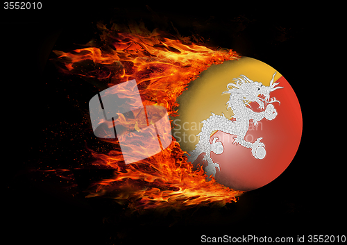 Image of Flag with a trail of fire - Bhutan