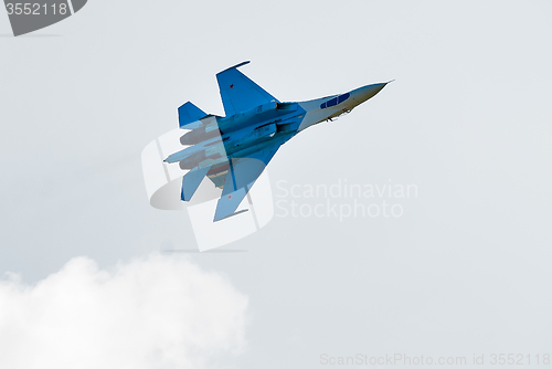 Image of Fighter SU-27 flies upside down