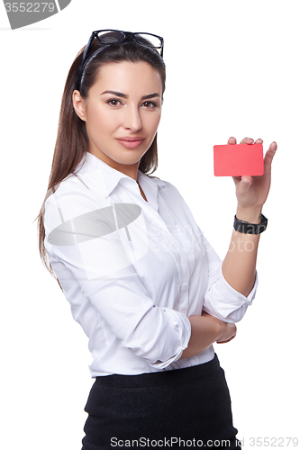 Image of Business woman holding credit card
