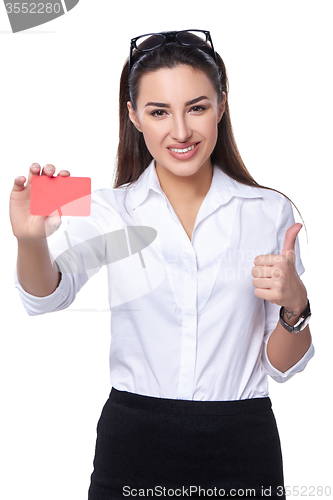 Image of Business woman holding credit card