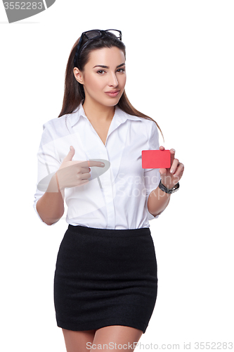 Image of Business woman holding credit card