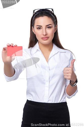 Image of Business woman holding credit card