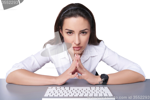 Image of Business woman pointing at imaginary button