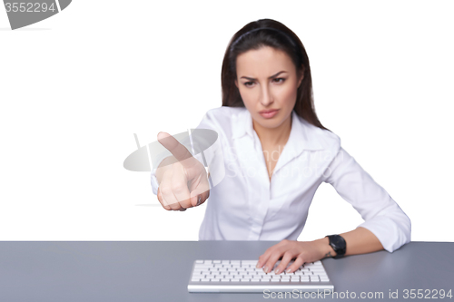 Image of Business woman pointing at imaginary button