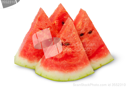 Image of Four slices of ripe watermelon near