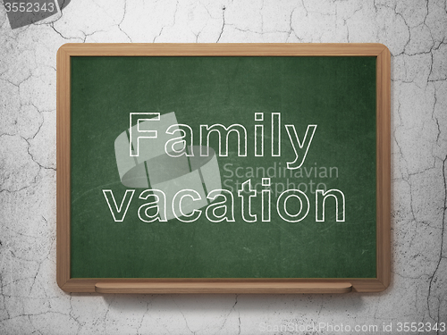 Image of Tourism concept: Family Vacation on chalkboard background