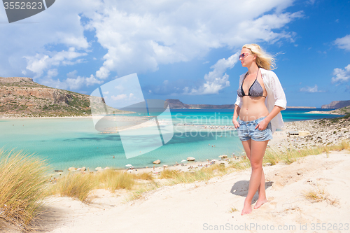 Image of Free Happy Woman Enjoying Sun on Vacations.