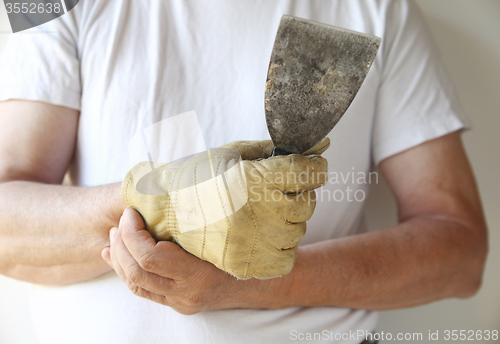 Image of man working with a painful wrist	