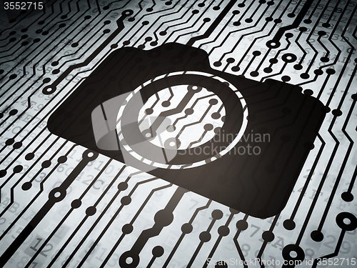 Image of Vacation concept: circuit board with Photo Camera
