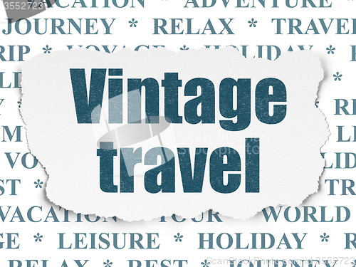 Image of Travel concept: Vintage Travel on Torn Paper background