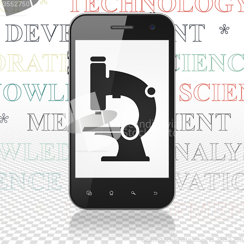 Image of Science concept: Smartphone with Microscope on display