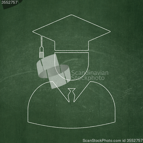 Image of Science concept: Student on chalkboard background