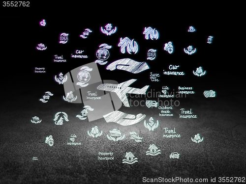 Image of Insurance concept: Airplane And Palm in grunge dark room