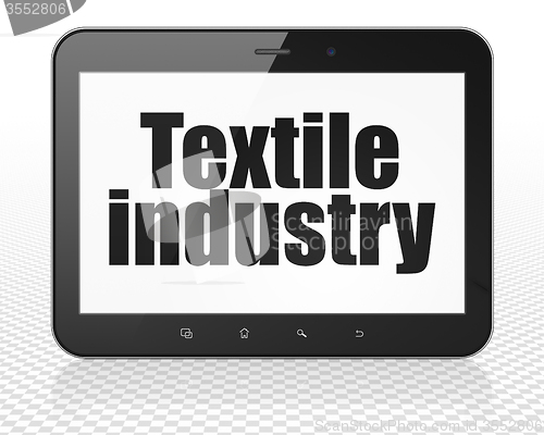 Image of Industry concept: Tablet Pc Computer with Textile Industry on display