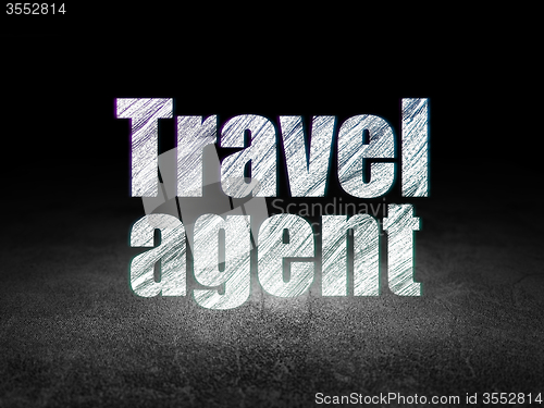 Image of Vacation concept: Travel Agent in grunge dark room