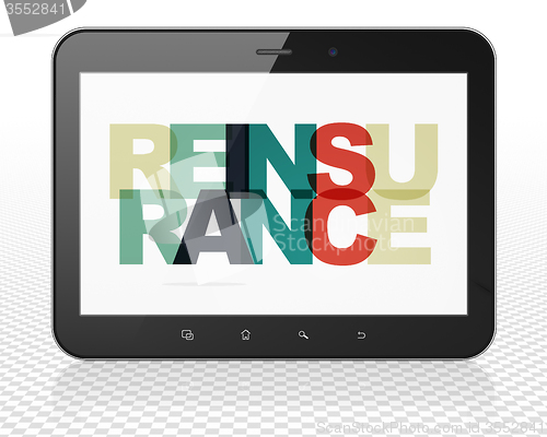 Image of Insurance concept: Tablet Pc Computer with Reinsurance on  display