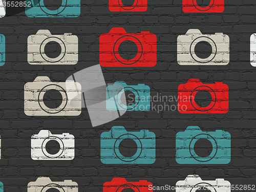 Image of Vacation concept: Photo Camera icons on wall background