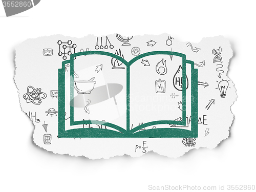 Image of Science concept: Book on Torn Paper background