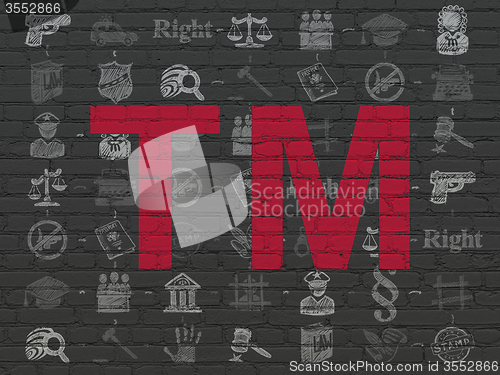 Image of Law concept: Trademark on wall background