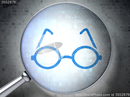 Image of Studying concept: Glasses with optical glass on digital background
