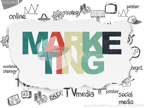 Image of Advertising concept: Marketing on Torn Paper background