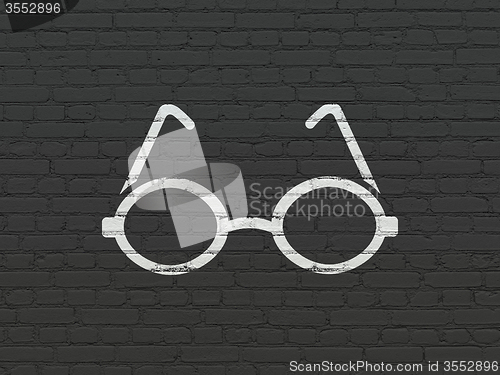 Image of Science concept: Glasses on wall background