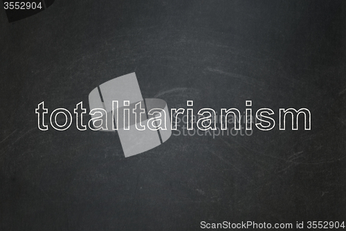Image of Political concept: Totalitarianism on chalkboard background