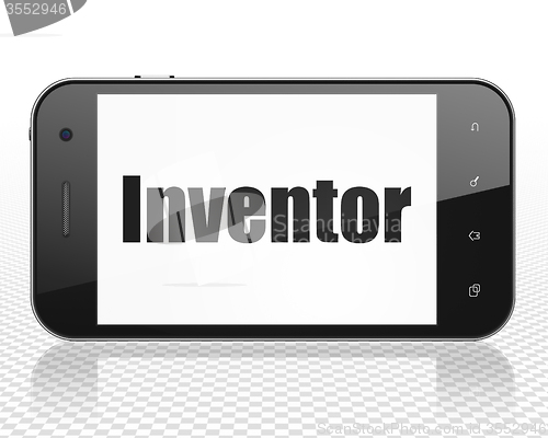 Image of Science concept: Smartphone with Inventor on display