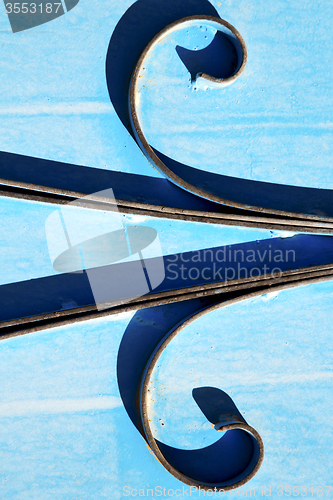 Image of blue hinges      rusty      morocco in    safe padlock 
