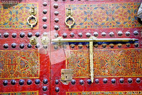 Image of metal rusty  brown    morocco in africa   and safe padlock 