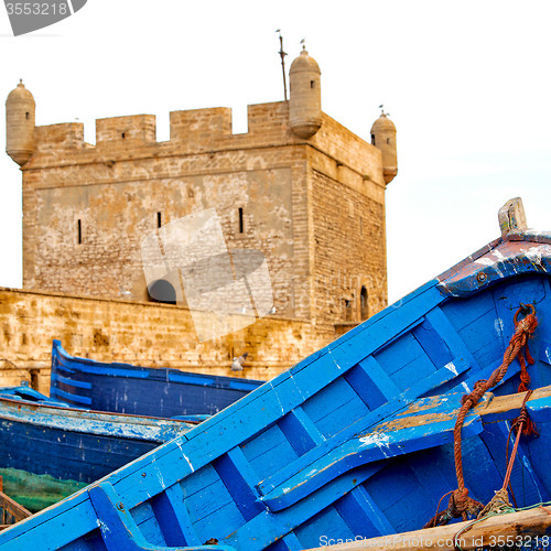 Image of   boat and sea in africa morocco old castle brown brick  sky